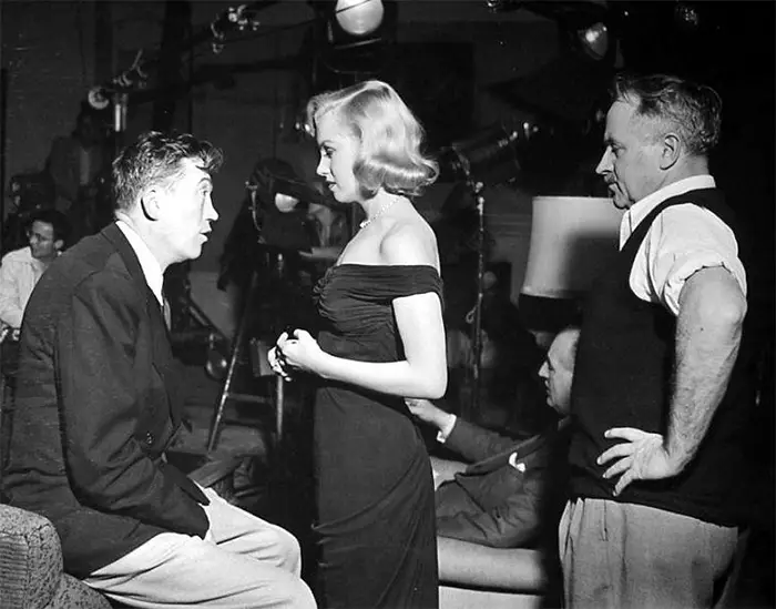 John Huston and Marilyn Monroe on set of the Asphalt Jungle